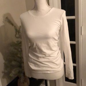 Long sleeved white shirt.